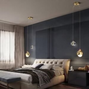 Nordic minimalist crystal pendant light hanging beside a bed
