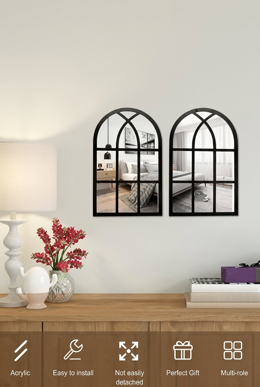 Set of 2 arched window mirrors stuck on a dining room wall above a wooden sideboard