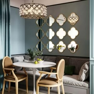 Four leaf clover wall mirror hanging above a wooden sideboard in a dining room