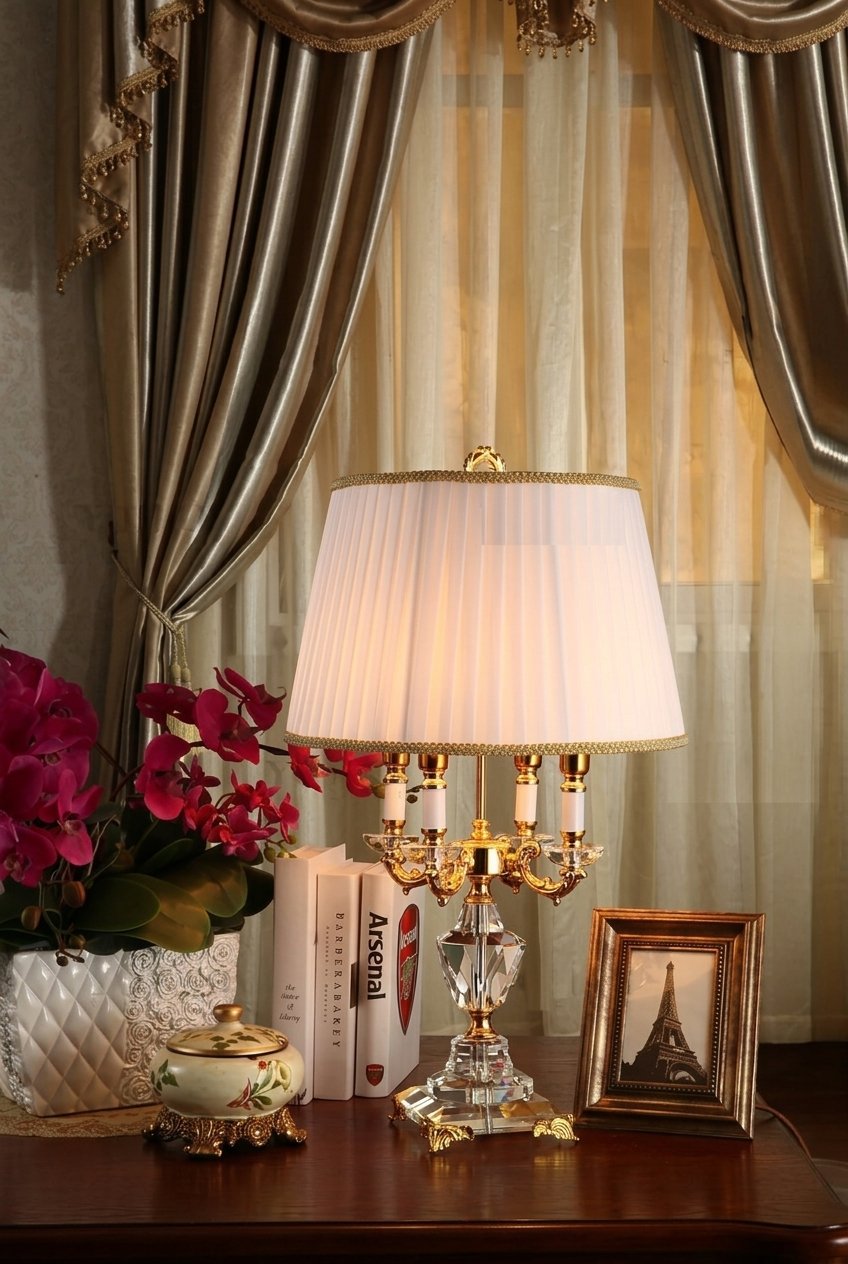Luxury crystal table lamp glowing on a bedroom nightstand